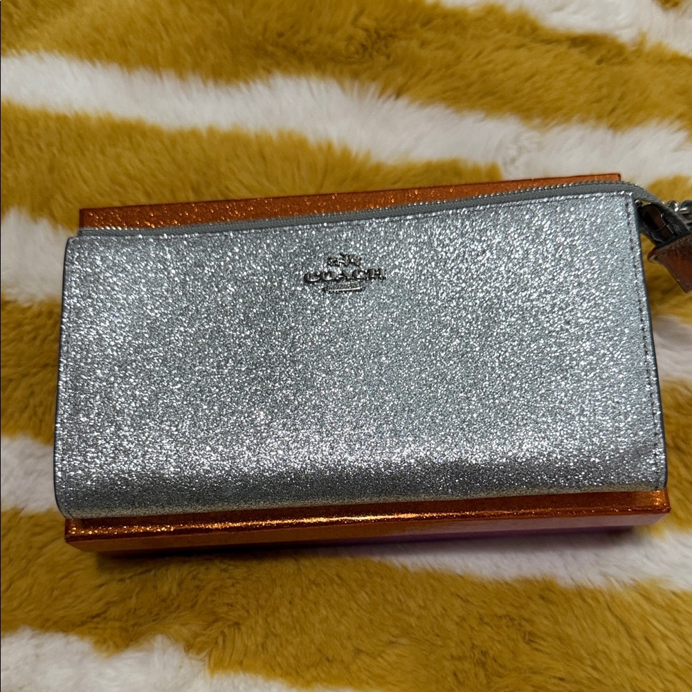 Coach Silver and Orange Glitter Wristlet